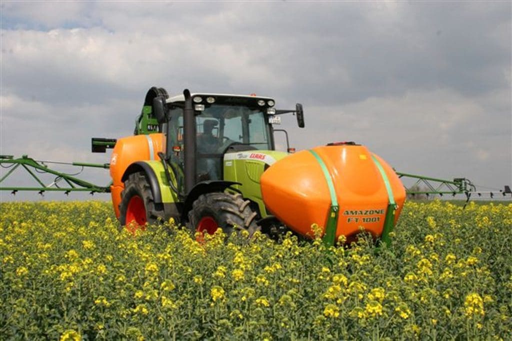 uf sprayer connected to a claas tractor