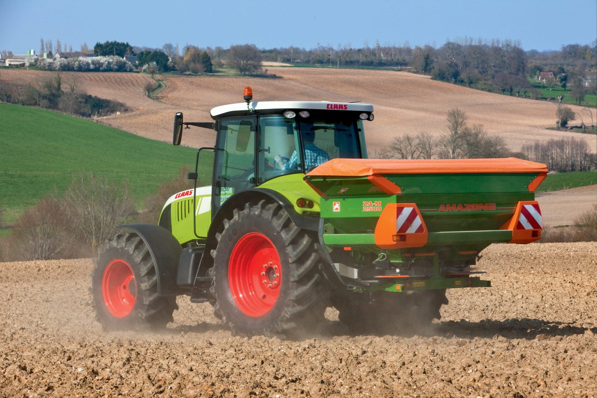 za-m spreader in action spraying in a paddock